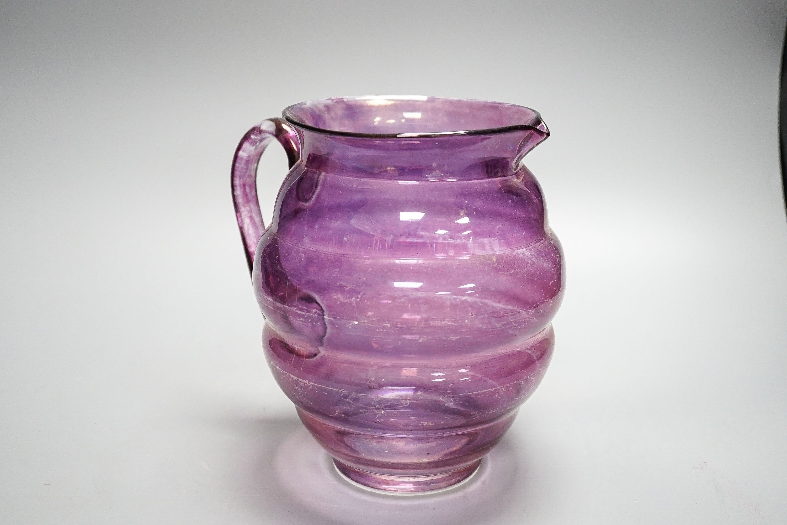 An amethyst flashed glass basin and jug.